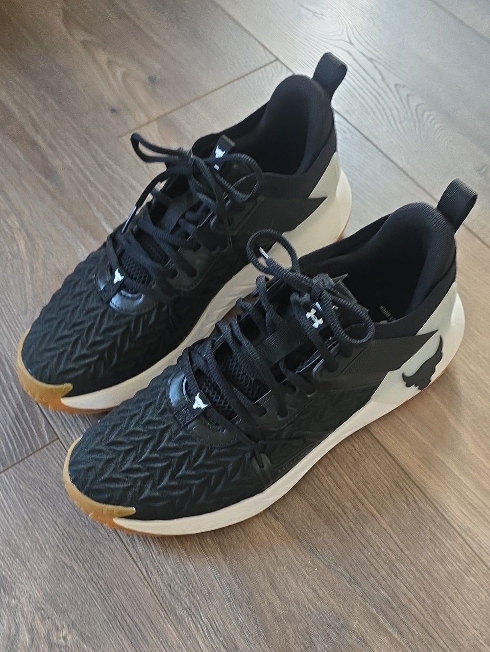 Under Armour Black Athletic Sneakers with Cream Midsole and Brown Accents